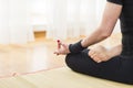 Closeup of Hand Fingers of Caucasian Brunette Woman Practicing Yoga Indoors. Doing Sukhasana Exercises In Lotus Therapy Pose. In Royalty Free Stock Photo