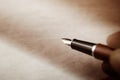 Closeup of hand with fountain pen Royalty Free Stock Photo