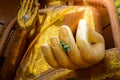 Closeup at hand of Gold big buddha statue temple wat tham sua