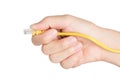 Closeup hand holding electrical plug and Lan cable Royalty Free Stock Photo