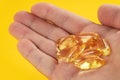 closeup hand holding fish oil vitamin for healthy Royalty Free Stock Photo