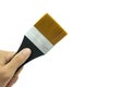 Closeup hand holding paint brush for art or texture copy space. isolated on white background and clipping path Royalty Free Stock Photo