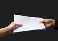 closeup hand holding a stack of paper mockup Royalty Free Stock Photo