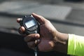 Closeup of hand holding stopwatch