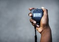 Closeup of Hand holding a stopwatch