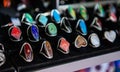 Closeup of hand made rings with colorful stones on