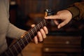 Closeup hand of male musician playing guitar Royalty Free Stock Photo