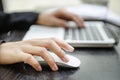 Closeup of hand on mouse