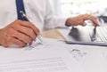 Closeup of hand, paperwork and architect, blueprint and laptop with writing, contractor and building design