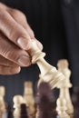 Closeup Of Hand Playing Chess