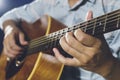 Closeup of hand playing guitar Royalty Free Stock Photo