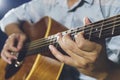 Closeup of hand playing guitar Royalty Free Stock Photo