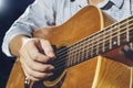 Closeup of hand playing guitar Royalty Free Stock Photo