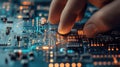 Closeup of Hand Selecting Electronics Device on Schematic Background: Precision and Technology in Focus Royalty Free Stock Photo