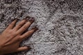 Closeup of Hand Touching Fur Fabric Texture. Smooth Fluffy Royalty Free Stock Photo