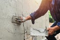 closeup hand of worker are plastering