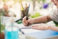 Closeup hand writing homework. Royalty Free Stock Photo