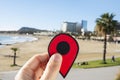Red marker at Somorrostro beach in Barcelona