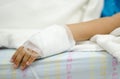 Closeup of hands attaching intravenous tube Royalty Free Stock Photo