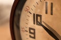 Closeup of hands on clock face Royalty Free Stock Photo