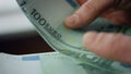 Closeup hands counting money cash. Cashier man holding bills european currency. Royalty Free Stock Photo