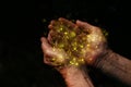 closeup hands of elderly man begging for help. concept for poverty or hunger or seeking for light in the dark.