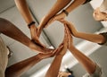 Closeup of hands of group of businesspeople in a circle. Diverse designers united in support. Fashion designer Royalty Free Stock Photo