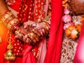 Closeup of hands with henna tattoos during an Indian traditional wedding ceremony, kanyadan ritual Royalty Free Stock Photo