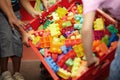 Closeup, hands and kids with plastic blocks, colors and playing with fun, games and education. Zoom, children or young Royalty Free Stock Photo