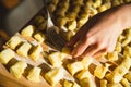Closeup hands making traditional homemade italian gnocchi fresh pasta Royalty Free Stock Photo