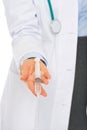 Closeup on hands of medical doctor giving syringe Royalty Free Stock Photo