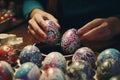 Closeup of hands painting and decorating Easter