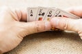 Closeup of hands with playing cards Royalty Free Stock Photo