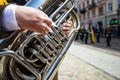 Closeup of hands playing tuba Royalty Free Stock Photo