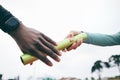 Closeup, hands and relay for competition, training and fitness for wellness, healthy lifestyle and exercise. Zoom, hand Royalty Free Stock Photo