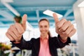 Closeup of hands, Smiling Business Woman Making Frame Gesture with at modern bright coworking open space startup office Royalty Free Stock Photo