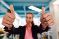 Closeup of hands, Smiling Business Woman Making Frame Gesture with at modern bright coworking open space startup office Royalty Free Stock Photo