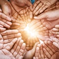 Closeup, hands and teamwork with collaboration, partnership and charity with sun flare. Group, people or volunteers with Royalty Free Stock Photo