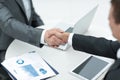 Closeup .handshake of business partners above the Desk Royalty Free Stock Photo