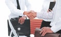 Closeup.handshake of business people on the background of the office Royalty Free Stock Photo
