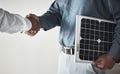 Closeup, handshake and business with solar panels, mockup and partnership for sustainability. Zoom, men and employees Royalty Free Stock Photo