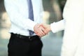 Closeup .the handshake of a businessman and business woman. Royalty Free Stock Photo