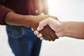 Closeup handshake showing success, support and trust between collaborating businessmen. Fingers of creative office Royalty Free Stock Photo