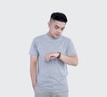 Closeup handsome man was posing wearing heather grey t-shirt short sleeve with mockup concept Royalty Free Stock Photo