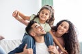 Closeup Of Happy Arab Family Of Three Having Fun Together At Home Royalty Free Stock Photo