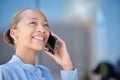 Closeup of a happy and beautiful smiling businesswoman while on the phone. Female adult manager making answering call in Royalty Free Stock Photo