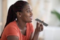 Closeup Of Happy Black Woman Recording Voice Message On Smartphone At Home Royalty Free Stock Photo