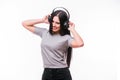 Closeup of happy brunet caucasian girl listen dancing to music with headphones Royalty Free Stock Photo