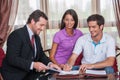 Closeup on happy man signing agreement on new house. Royalty Free Stock Photo