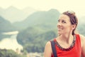 Closeup happy woman with Bavarian Alps Germany